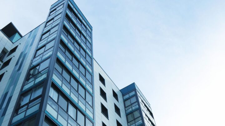 low angle view of office building against sky